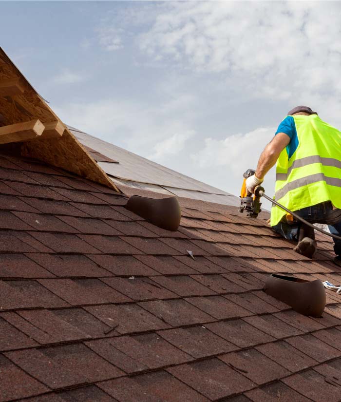 An Owens Corning preferred contractor team member installing high-quality composition shingles on a residential roof in the Bay Area, ensuring long-term protection against the elements.