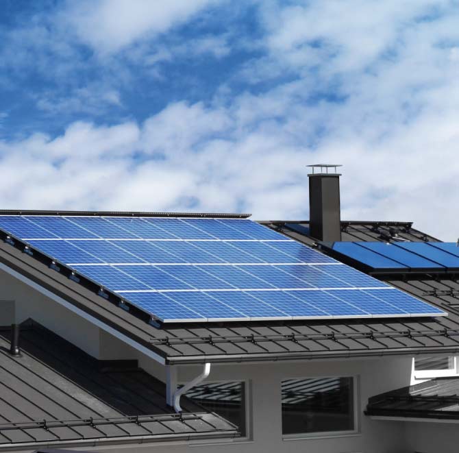 Modern home in Sacramento featuring a complete roof system remodel with seamless solar panel integration, installed by Capital Roofcare & Renovation for long-term performance.