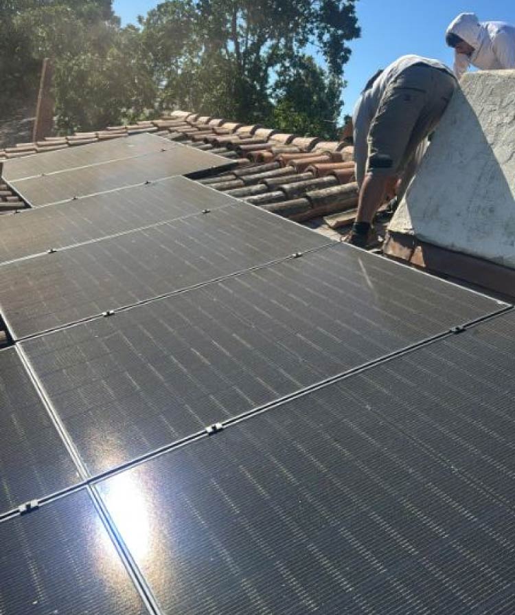 Close-up of a high-efficiency solar panel installation in the Greater Bay Area, part of a sustainable roof system upgrade backed by a 10-year workmanship warranty.